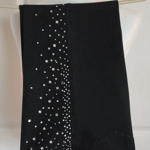 Black denim jeans with lots of bling